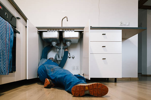 Professional Drain Cleaning technician working in Marshall, NC